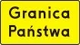 Das Schild weist auf die Staatsgrenze hin